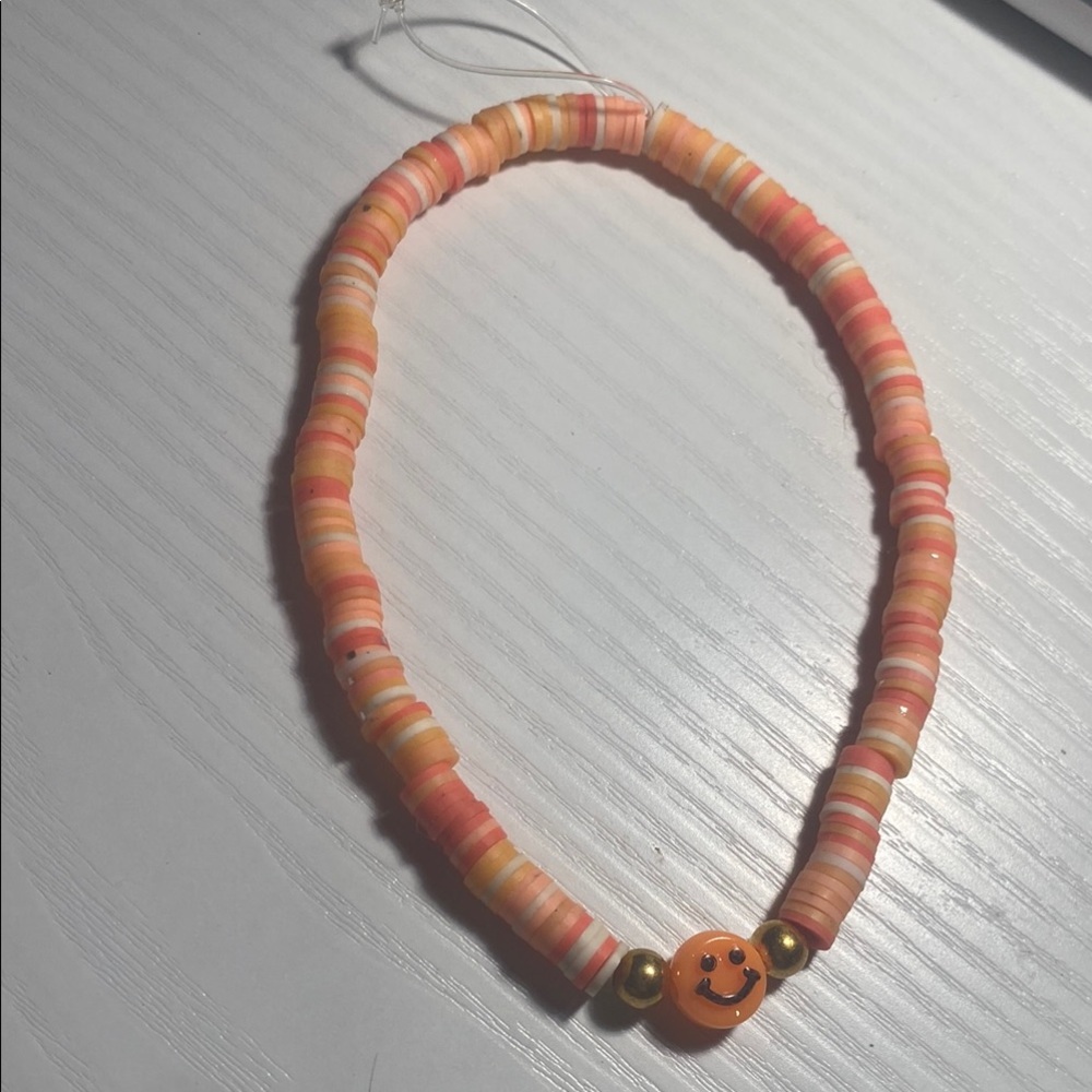 Colorful Beaded Phone Carm with Smiley Charm